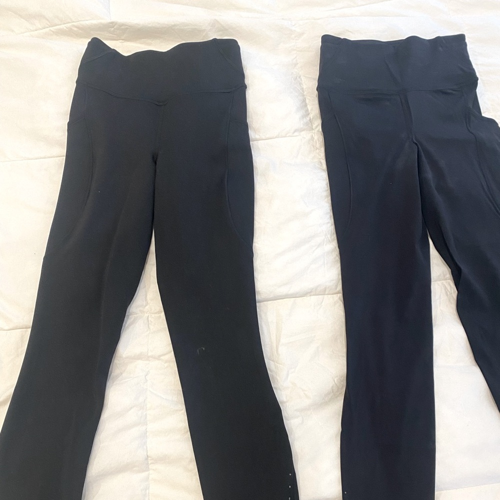 Lululemon size 2, 23 length. TWO PAIRS. Black. Good condition.